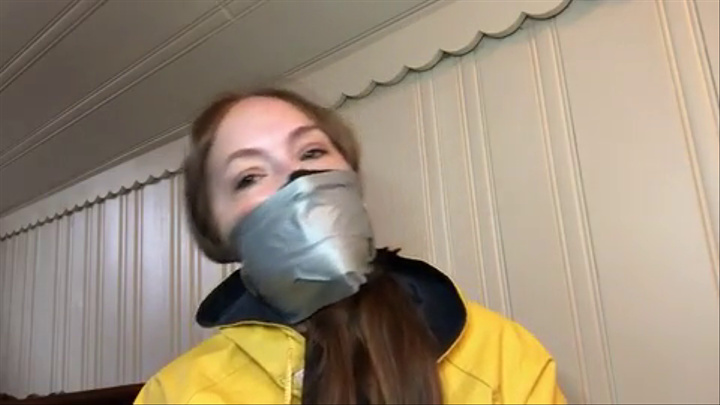 rachel secure tape wrap gag in raincoat